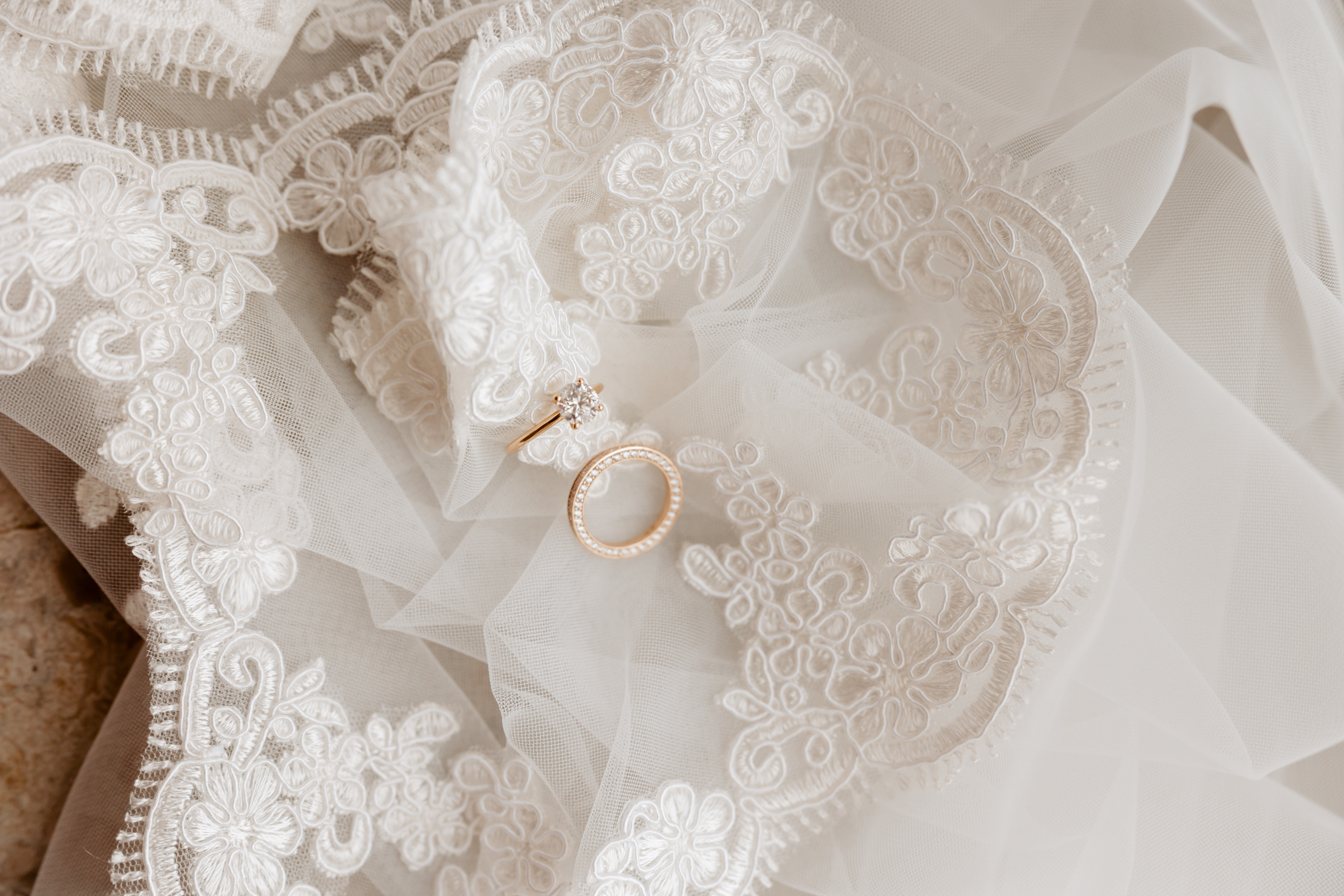Bespoke engagement rings laid out on a velvet tray at the LW atelier